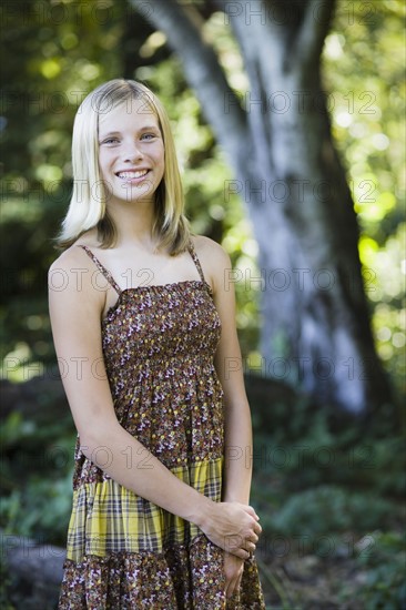 Young girl standing outside