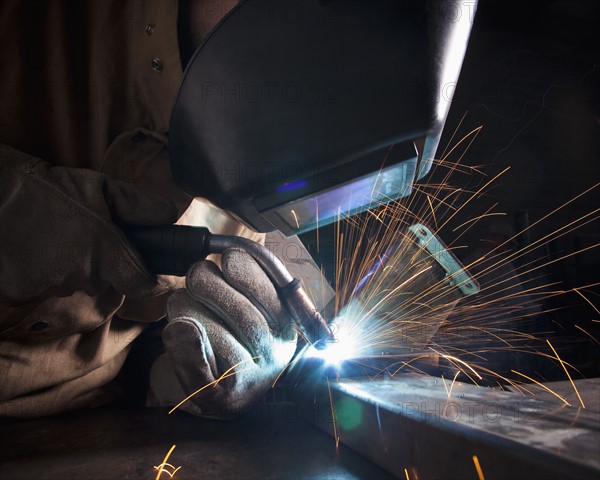 Steel worker in metal shop