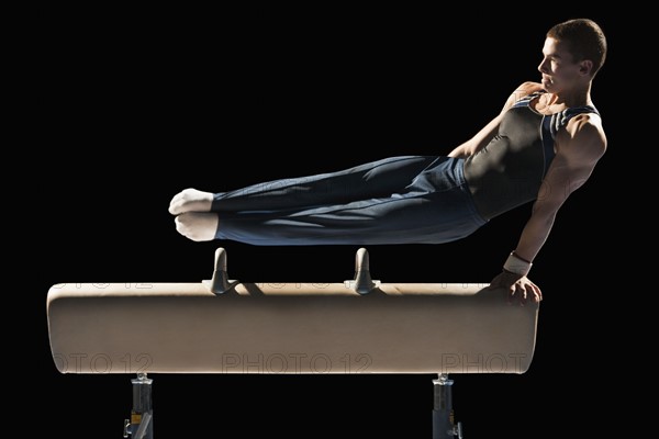 Gymnast on pommel horse