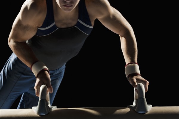 Gymnast on pommel horse