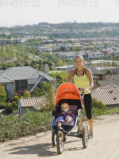 Woman pushing stroller