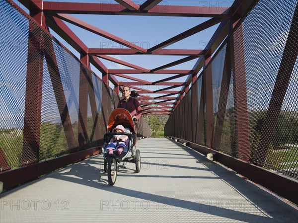 Woman jogging with stroller