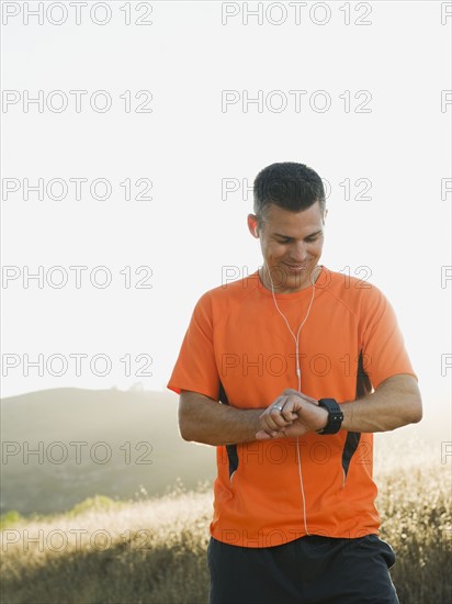 Man looking at watch