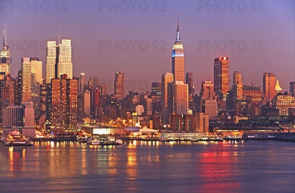 Waterfront buildings at sunset