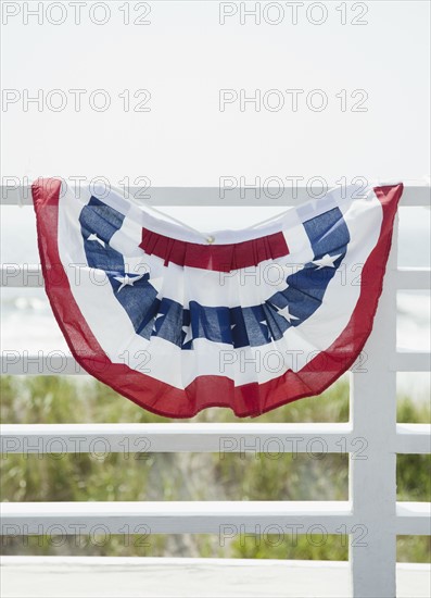American flag decoration on fence