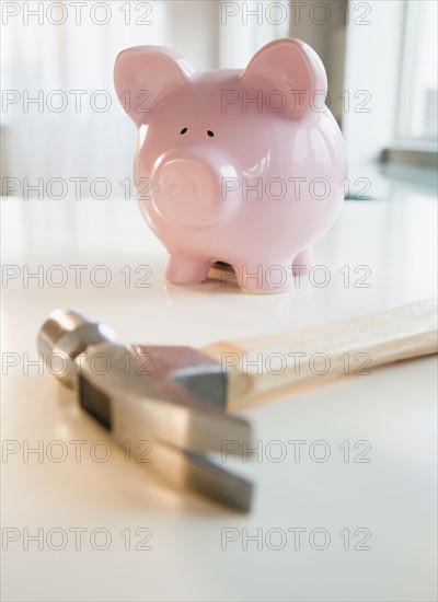 Hammer and piggy bank