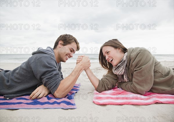 Couple arm wrestling