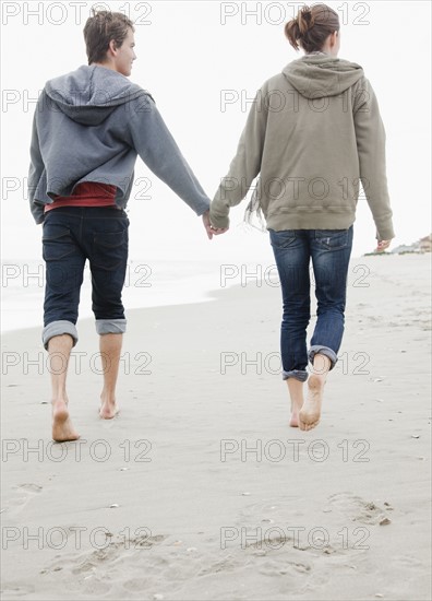 Couple holding hands