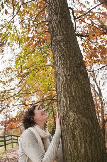 Woman looking at tree.