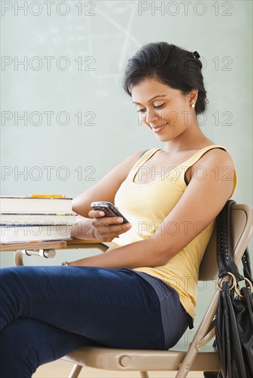 Woman looking at cellular phone