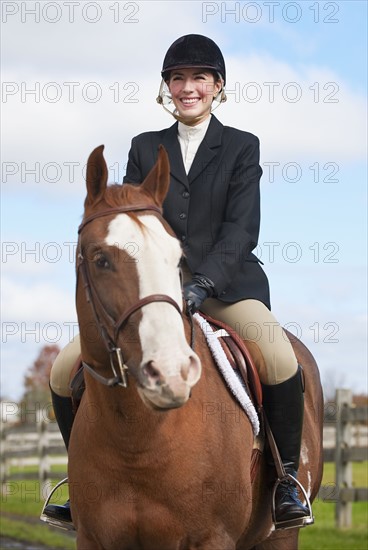 Equestrian rider.