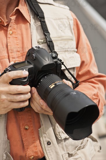 Man holding camera.