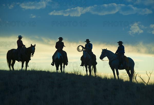 Horseback riders.