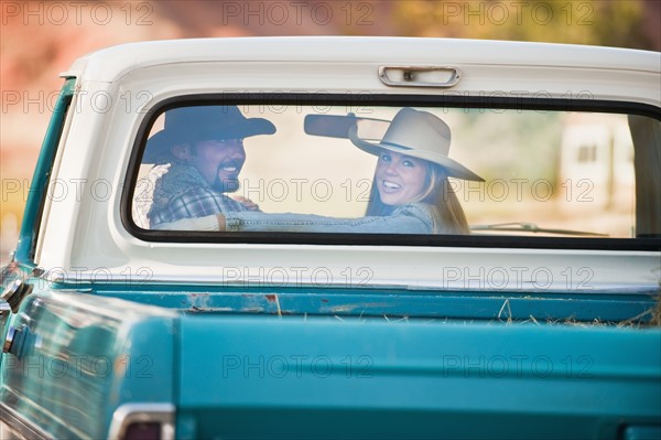 Couple in truck.