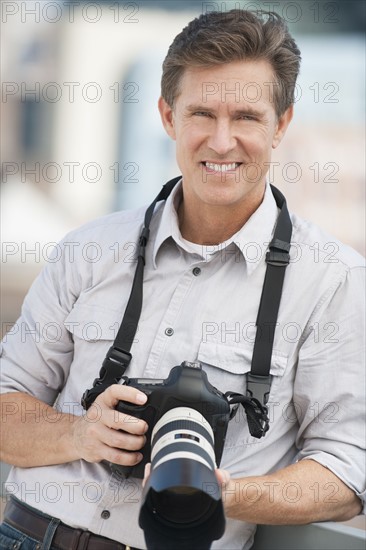 Man with camera.