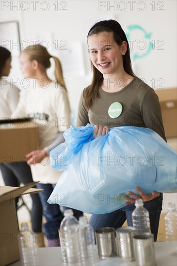 Volunteers recycling.