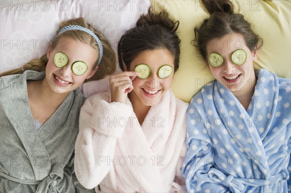 Girls having a facial.