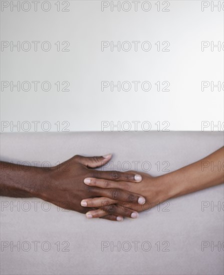 Holding hands. Photographer: momentimages