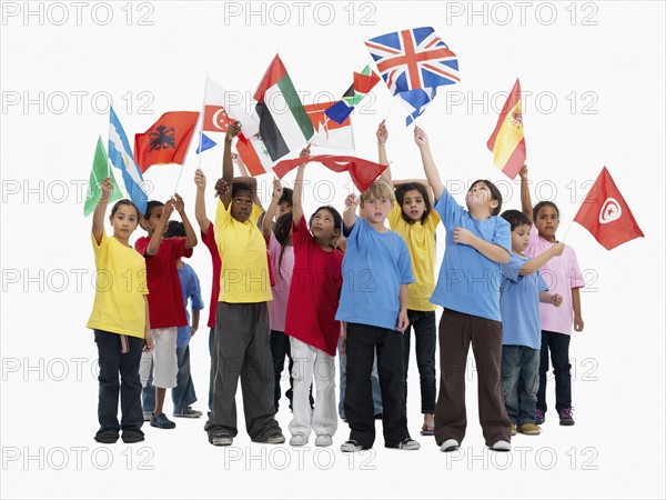 Children waving flags. Photographer: momentimages