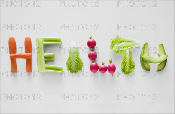 Vegetables spelling the word health. Photographer: Mike Kemp