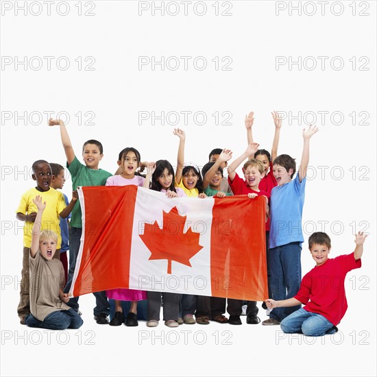 Children holding flag. Photographer: momentimages