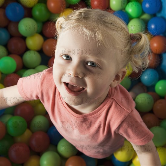 Girl playing in ball room. Photographer: Mike Kemp