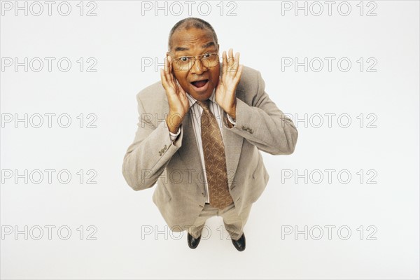 Surprised businessman. Photographer: Rob Lewine