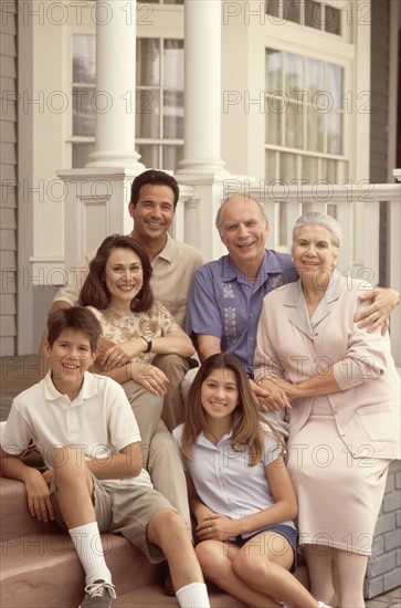 Family portrait on the porch. Photographer: Rob Lewine