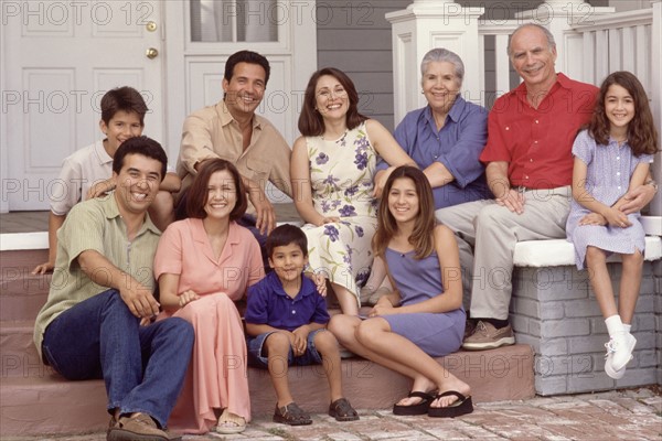 Family portrait on the porch. Photographer: Rob Lewine