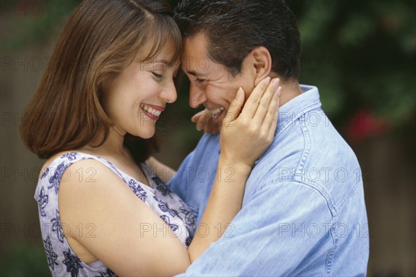 Couple embracing. Photographer: Rob Lewine