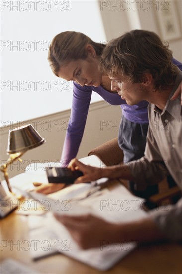 Couple doing finances. Photographer: Rob Lewine