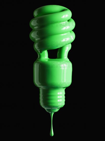 Light bulb covered in green paint. Photographer: Mike Kemp