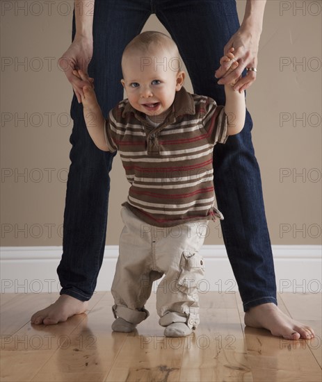 Toddler's first steps. Photographer: Mike Kemp