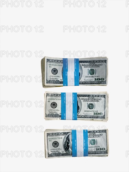 Piles of money. Photographer: David Arky