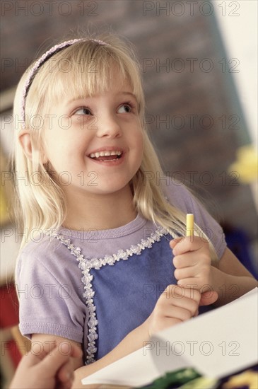 Girl in classroom. Photographer: Rob Lewine