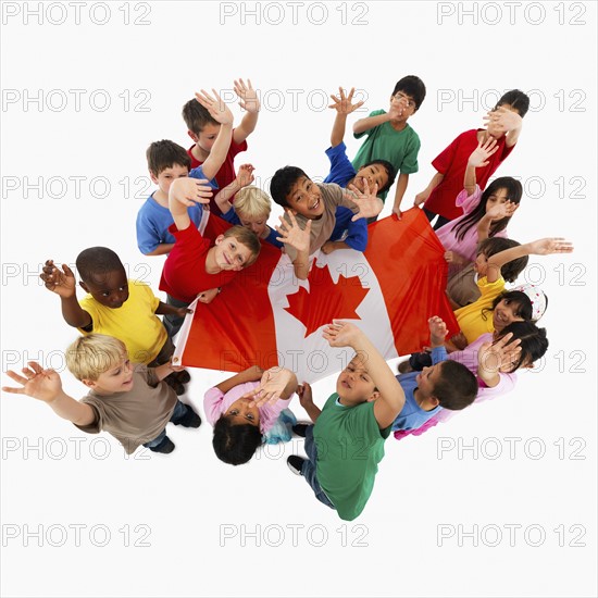 Children holding flag. Photographer: momentimages