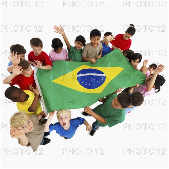 Children holding flag. Photographer: momentimages