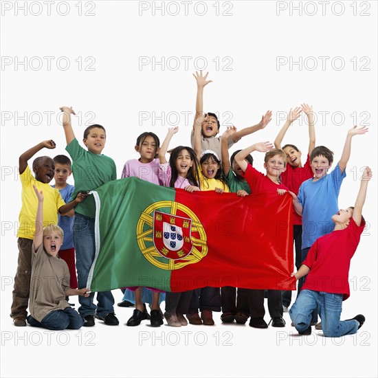 Children holding flag. Photographer: momentimages