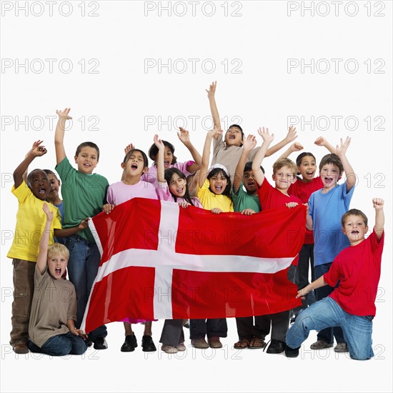 Children holding flag. Photographer: momentimages