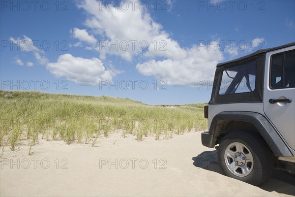 Jeep on the beach. Photographer: Chris Hackett