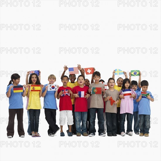 Children holding flags. Photographer: momentimages