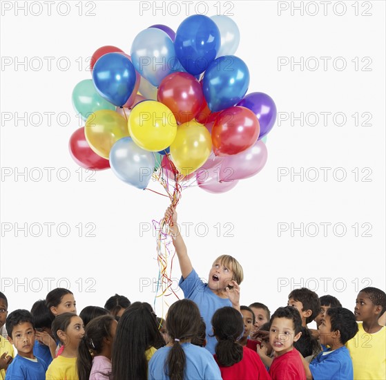 Children and balloons. Photographer: momentimages