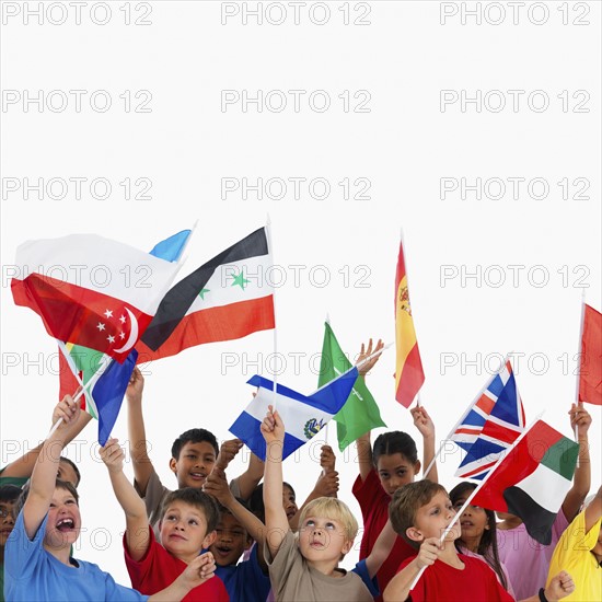 Children waving flags. Photographer: momentimages