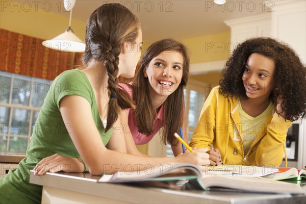 Friends doing homework. Photographer: mark edward atkinson