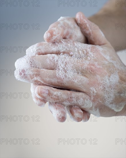 Washing hands.