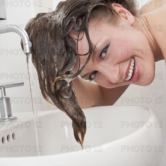 Woman washing hair.