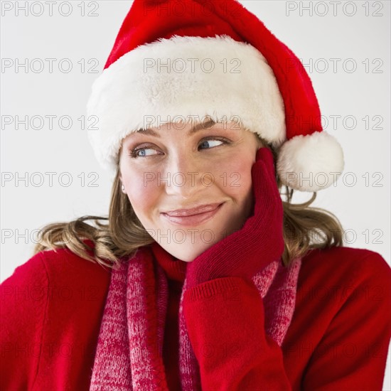 Woman wearing Santa hat.