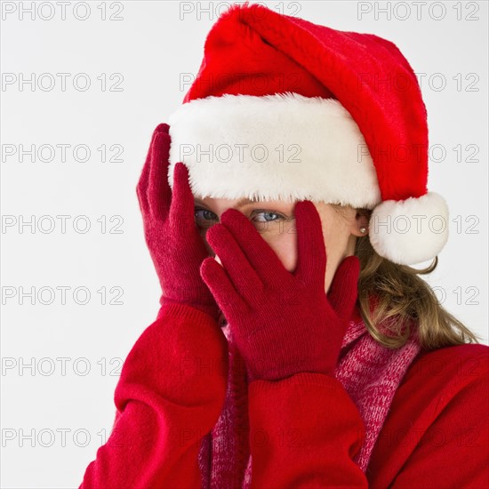 Woman wearing Santa hat.