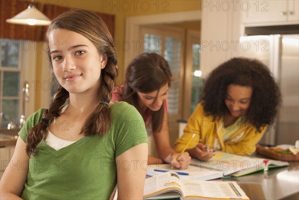 Friends doing homework. Photographer: mark edward atkinson