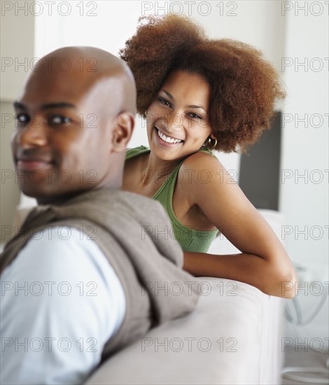 Couple on couch. Photographer: momentimages